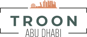 O logo de Troon Golf Abu Dhabi